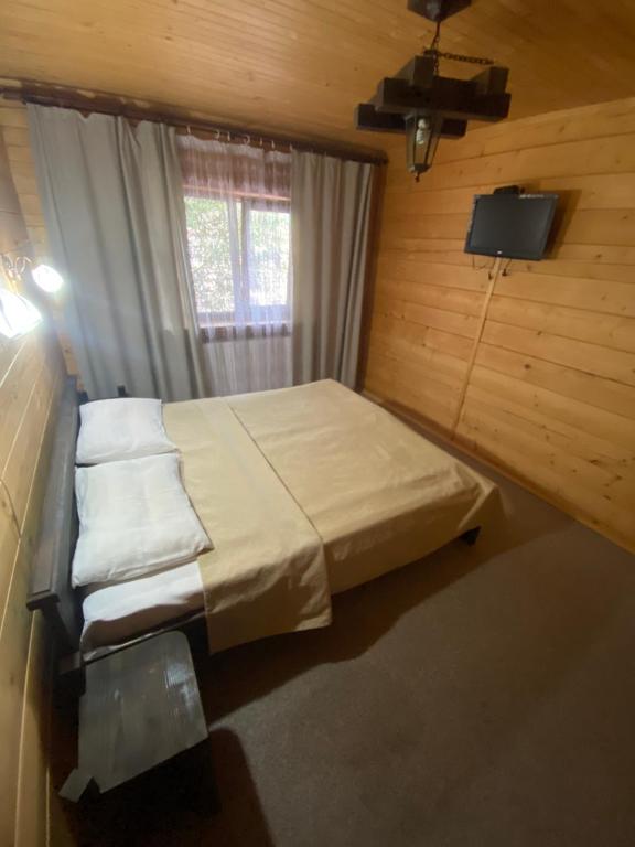 Postel nebo postele na pokoji v ubytování Highland