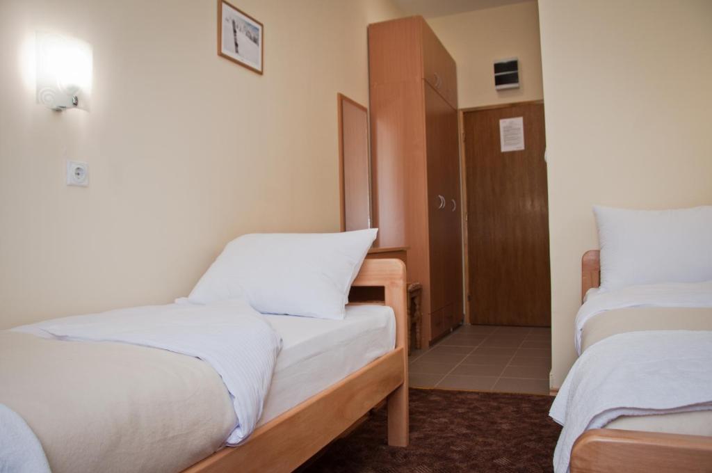Krevet ili kreveti u jedinici u okviru objekta Garni hotel Alma
