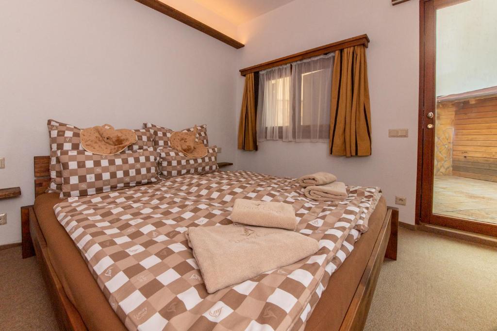 Postel nebo postele na pokoji v ubytování Seaside resort Vasiliki