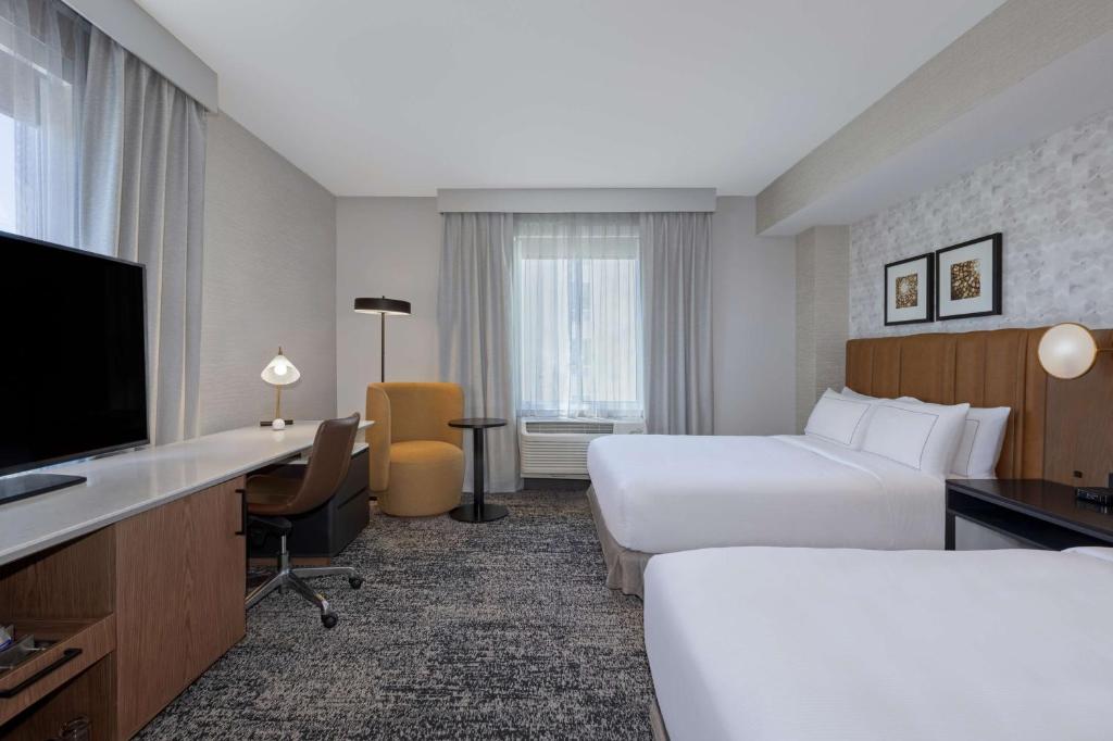 TV a/nebo společenská místnost v ubytování DoubleTree by Hilton Las Vegas East Flamingo