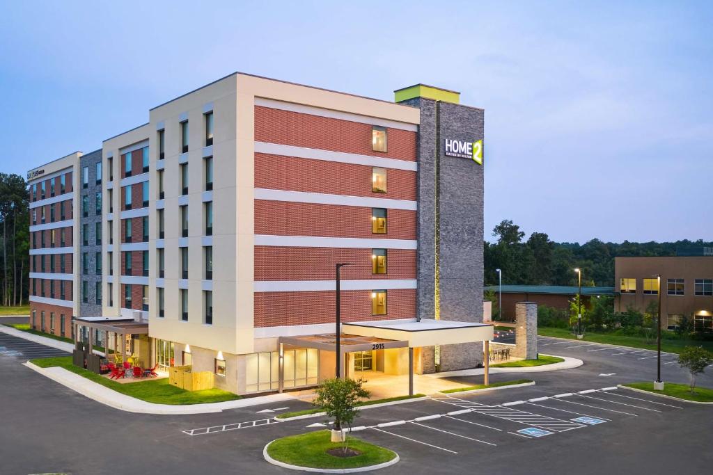 a rendering of a hotel with a parking lot at Home2 Suites By Hilton Richmond Glenside in Richmond
