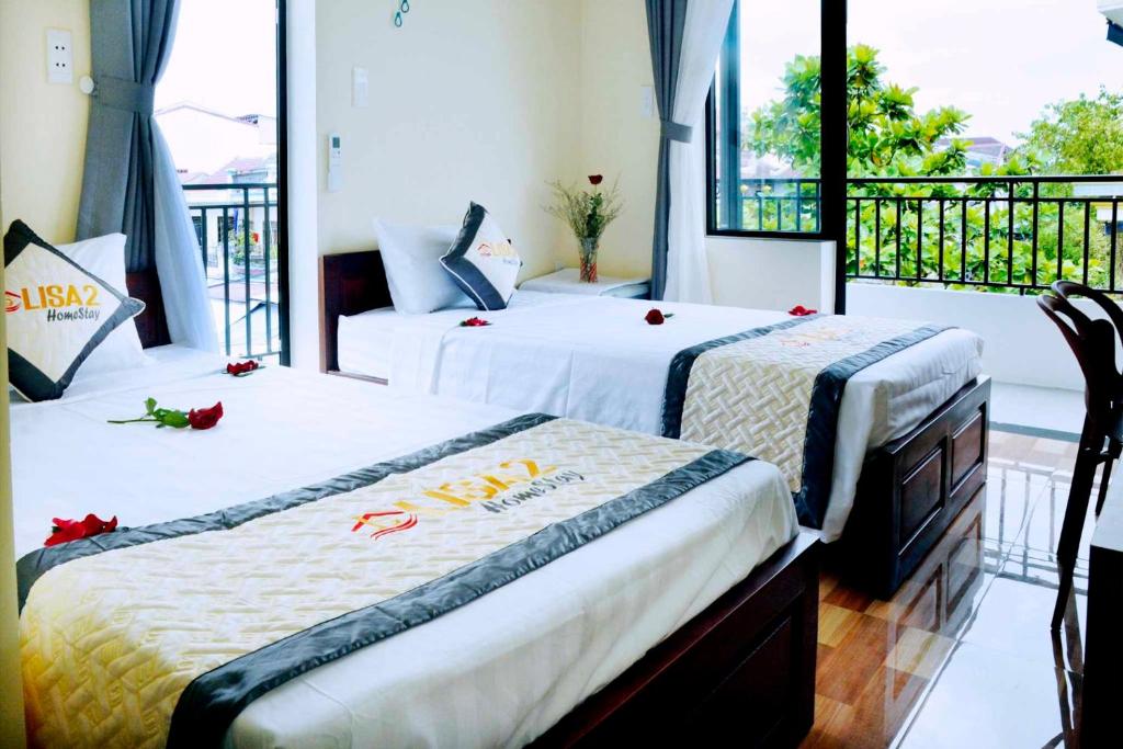 Postel nebo postele na pokoji v ubytování Lisa homestay 2