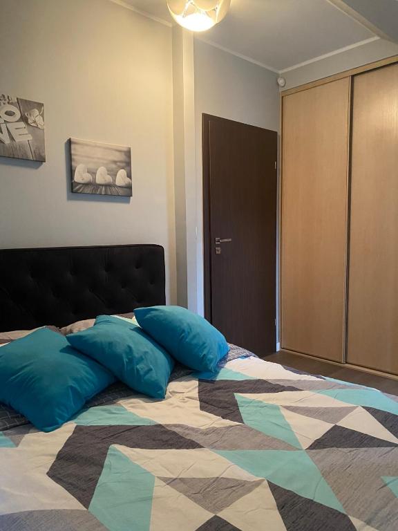 Łóżko lub łóżka w pokoju w obiekcie Hire House