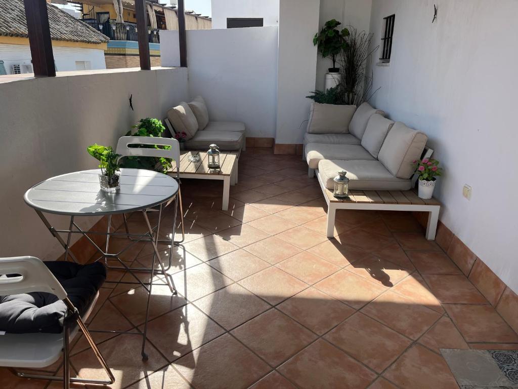 Posezení v ubytování Triana Pelay Suites