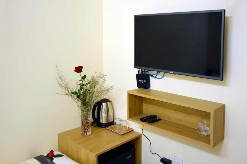 TV a/nebo společenská místnost v ubytování Lisa homestay 2