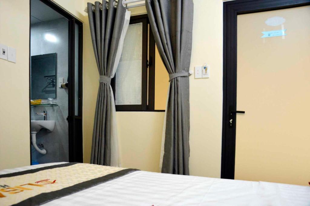 Postel nebo postele na pokoji v ubytování Lisa homestay 2