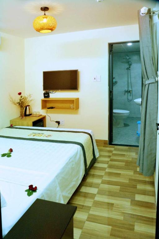Postel nebo postele na pokoji v ubytování Lisa homestay 2