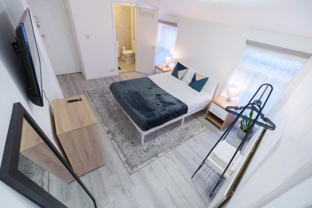 Μια τηλεόραση ή/και κέντρο ψυχαγωγίας στο Seafront Retreat Studio Flat Cleethorpes Beach