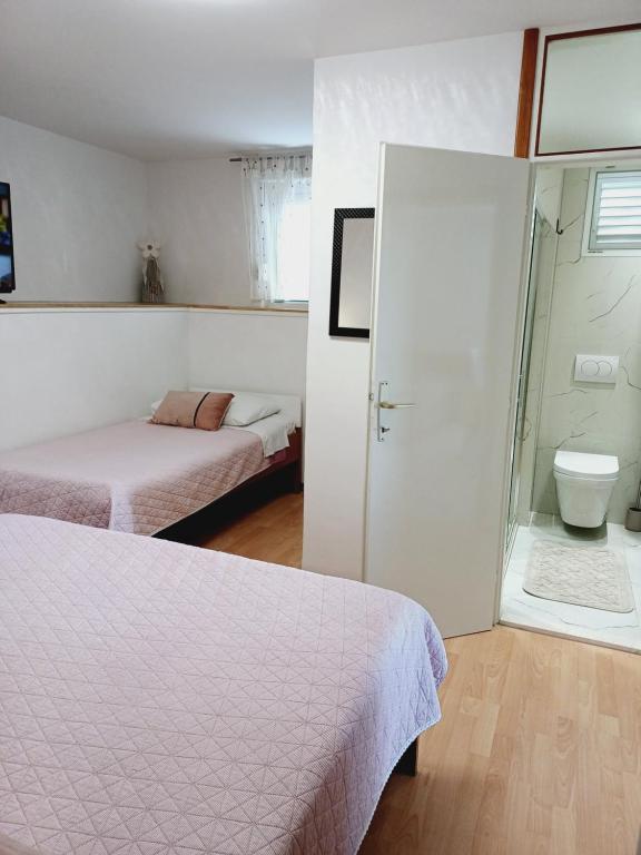 Kúpeľňa v ubytovaní Apartments Jure Miljak
