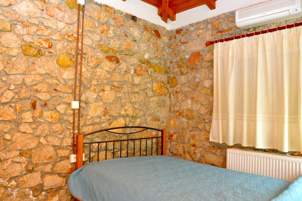 Postel nebo postele na pokoji v ubytování Iria Bay