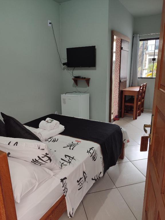 Postel nebo postele na pokoji v ubytování Hotel Lumiar