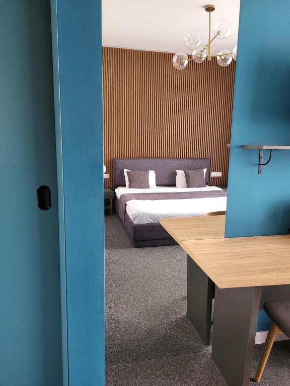 Postel nebo postele na pokoji v ubytování Sololaki Inn