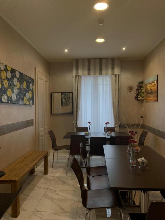 A seating area at Hotel Air Palace Lingotto