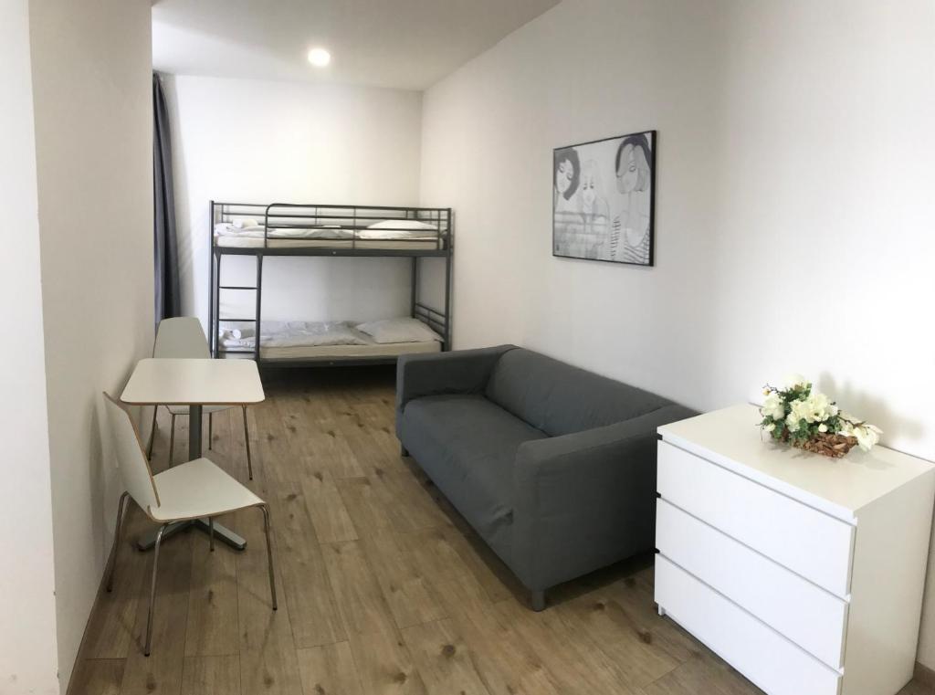 Postel nebo postele na pokoji v ubytování Rozmaryn Rooms & Apartments
