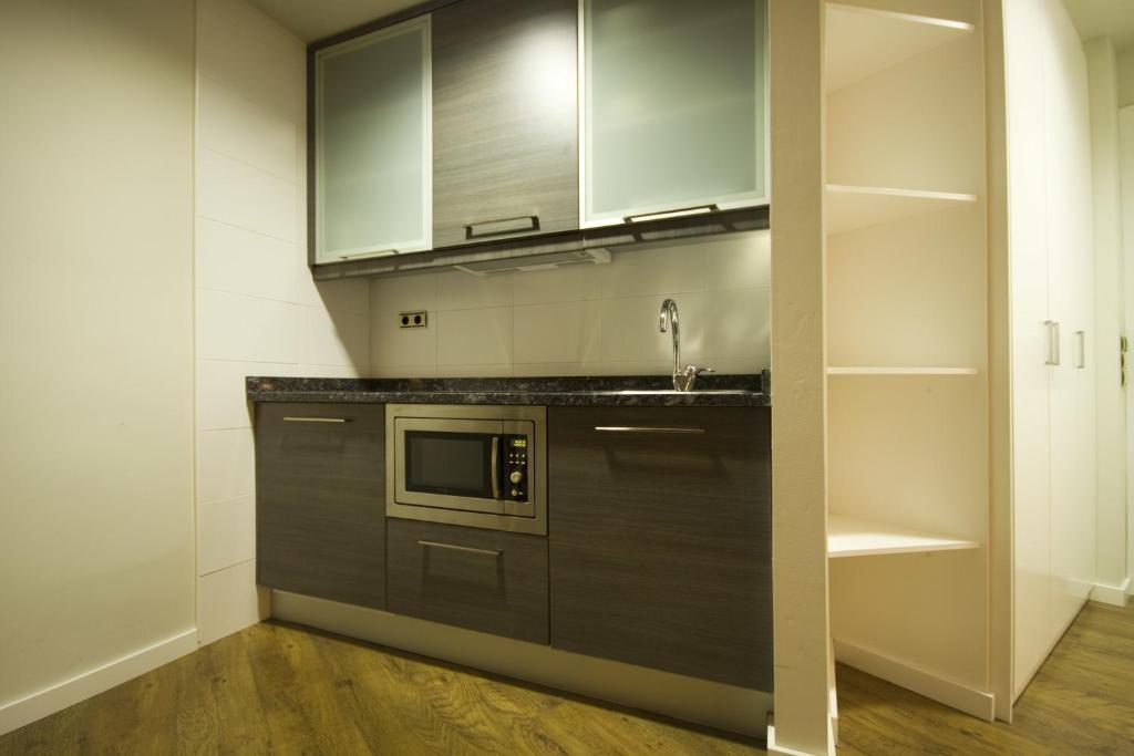 Kuchyň nebo kuchyňský kout v ubytování Hotel y Apartamentos SNÖ Isaba