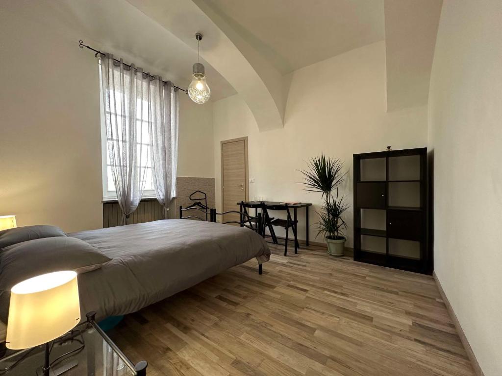 Postel nebo postele na pokoji v ubytování Al Belvedere Affittacamere