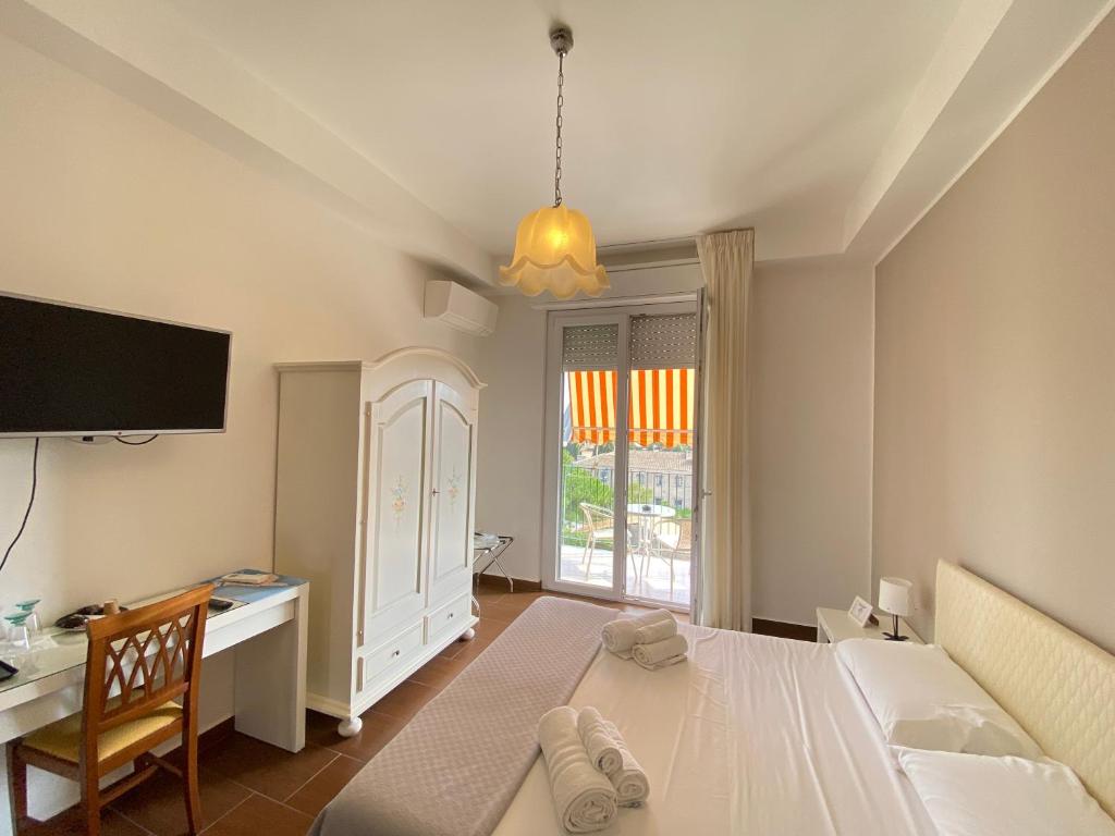 Postel nebo postele na pokoji v ubytování Panoramic Rooms