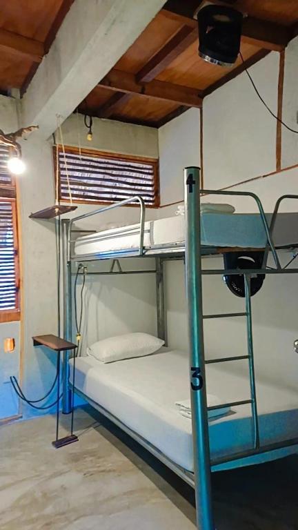 Postel nebo postele na pokoji v ubytování Guarumbo