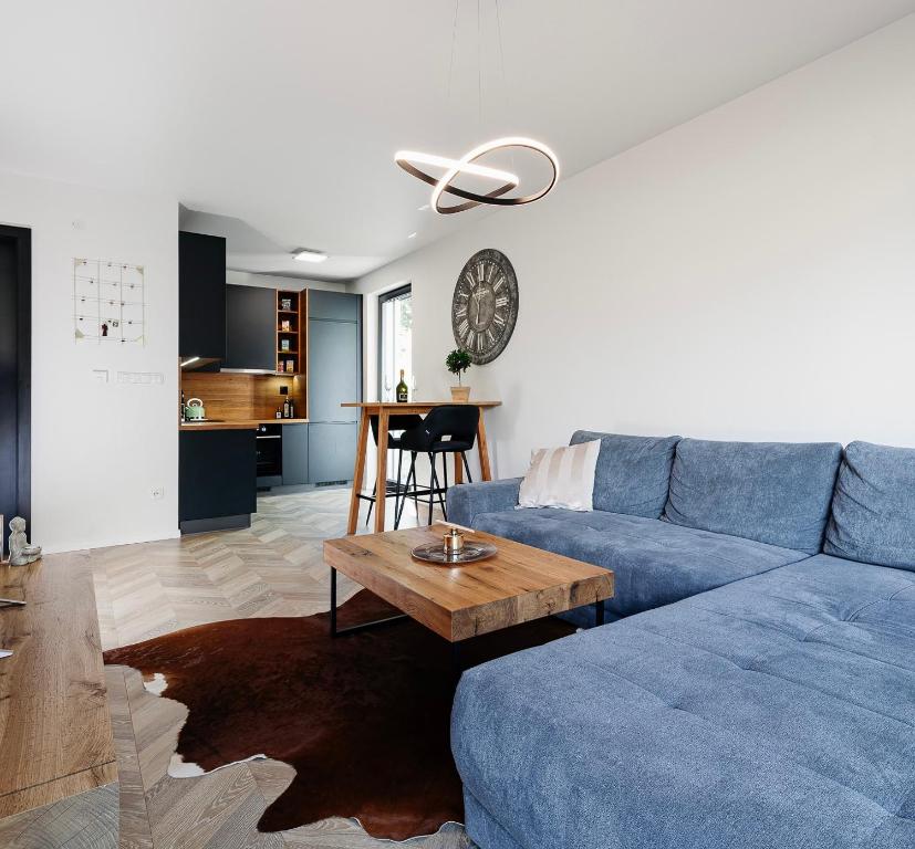 Posezení v ubytování Garden Apartment