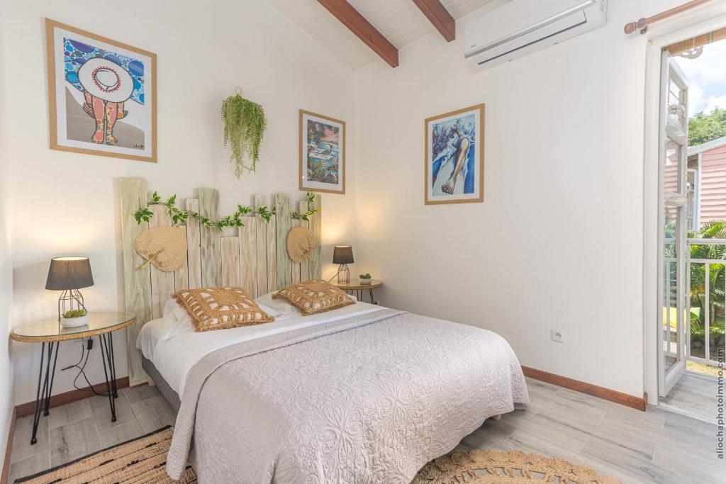 Postel nebo postele na pokoji v ubytování Villa Mahana