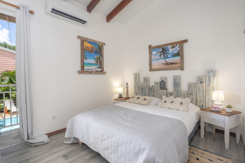 Postel nebo postele na pokoji v ubytování Villa Mahana