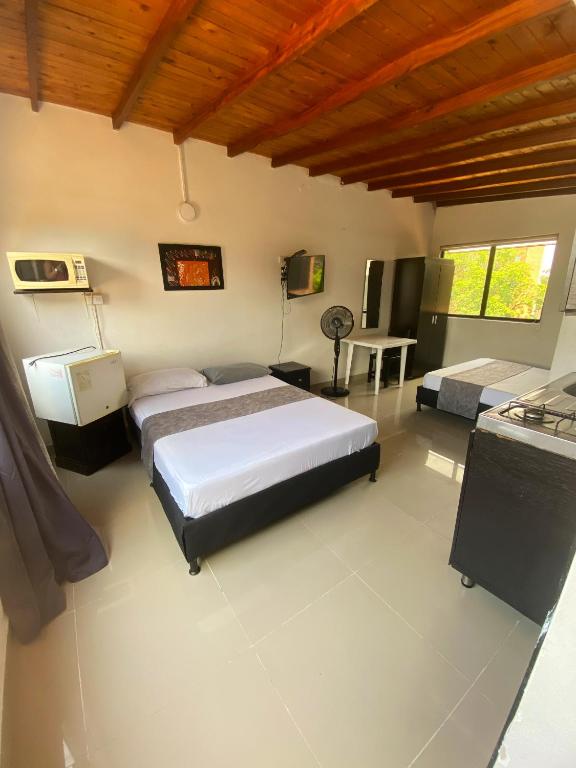Postel nebo postele na pokoji v ubytování 33 Hotel Bulerias