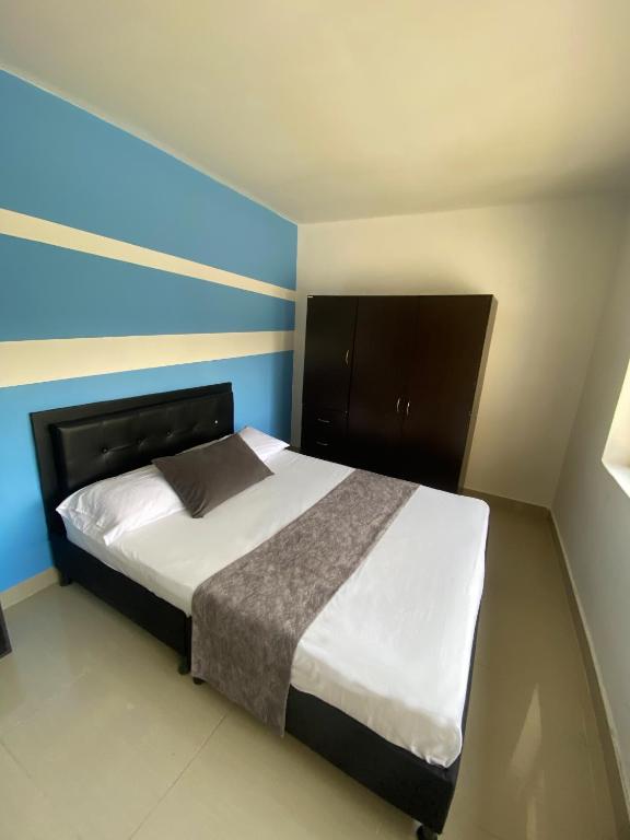 Postel nebo postele na pokoji v ubytování 33 Hotel Bulerias