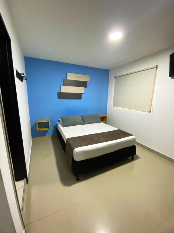 Postel nebo postele na pokoji v ubytování 33 Hotel Bulerias