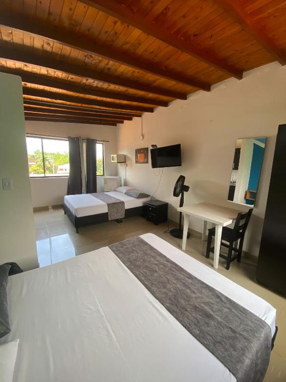Postel nebo postele na pokoji v ubytování 33 Hotel Bulerias