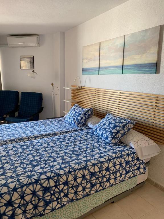 Posteľ alebo postele v izbe v ubytovaní Apartamentos Chinasolymar