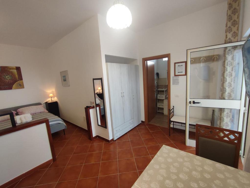 Postel nebo postele na pokoji v ubytování B&B Villa Nicoletta