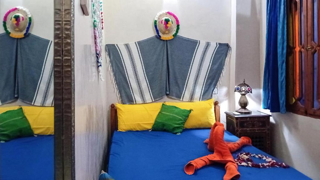 Postel nebo postele na pokoji v ubytování RIAD SULTAN Appart Marrakech