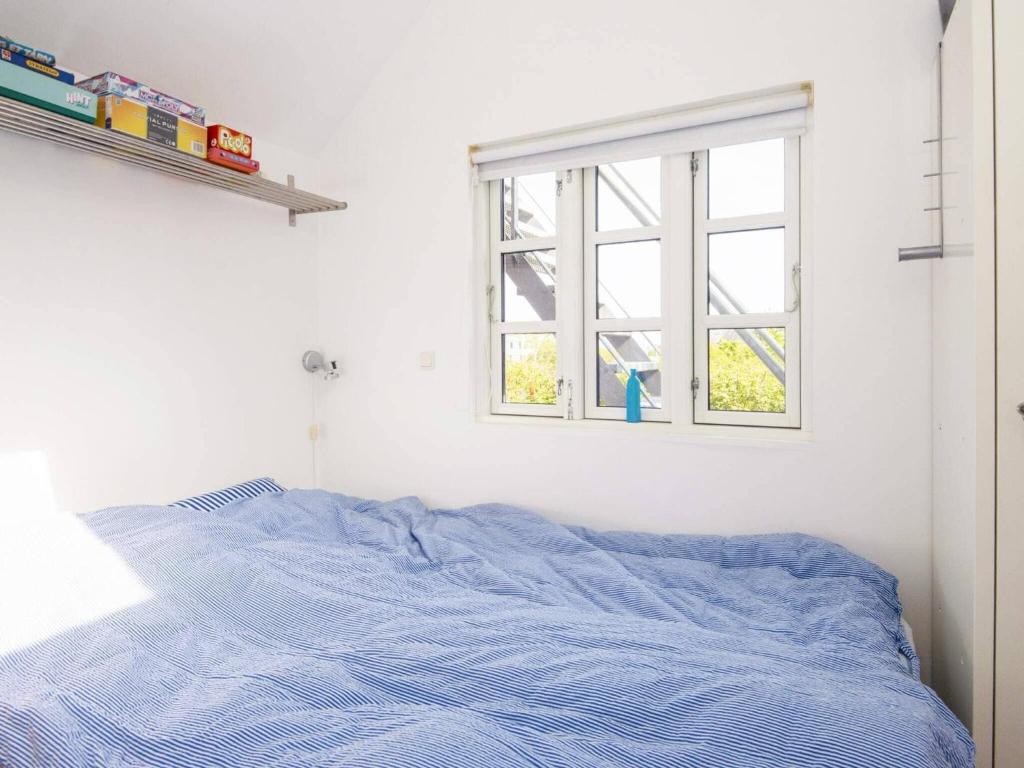Postel nebo postele na pokoji v ubytování Holiday home Grenaa L