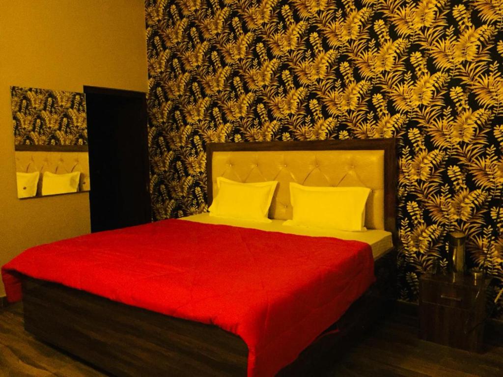 Postel nebo postele na pokoji v ubytování Hotel divine