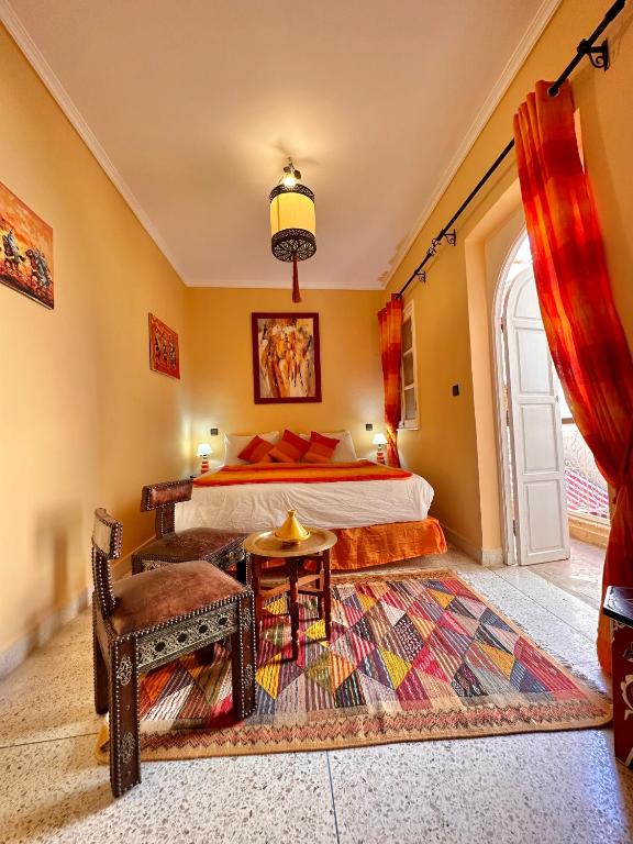 Postel nebo postele na pokoji v ubytování Riad Shaden
