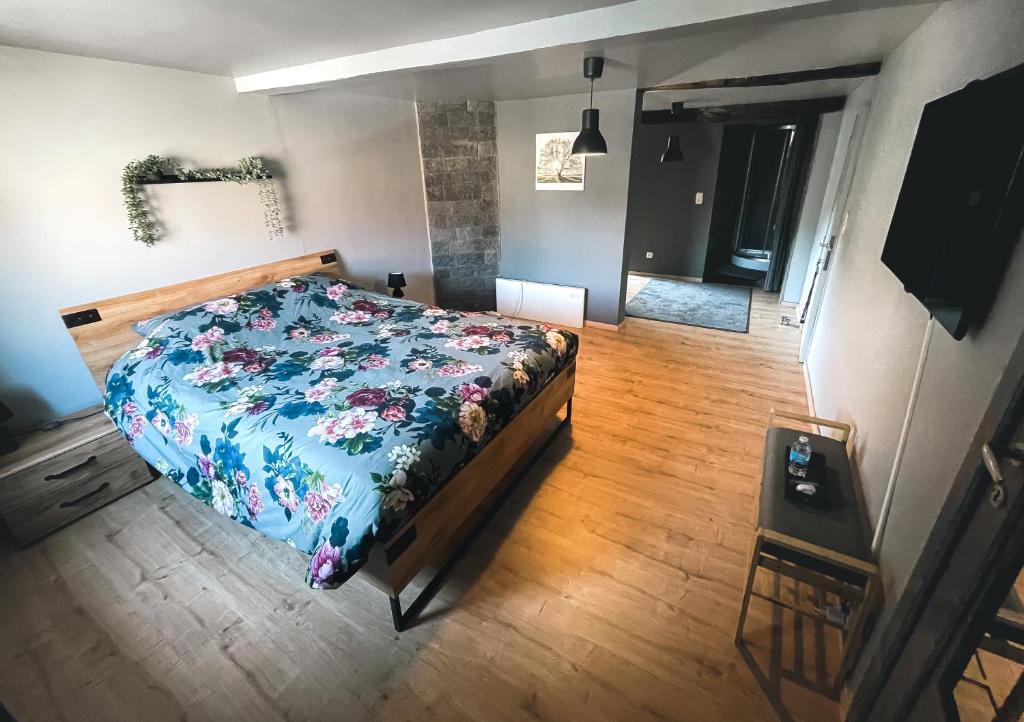 Postel nebo postele na pokoji v ubytování Le petit Broux