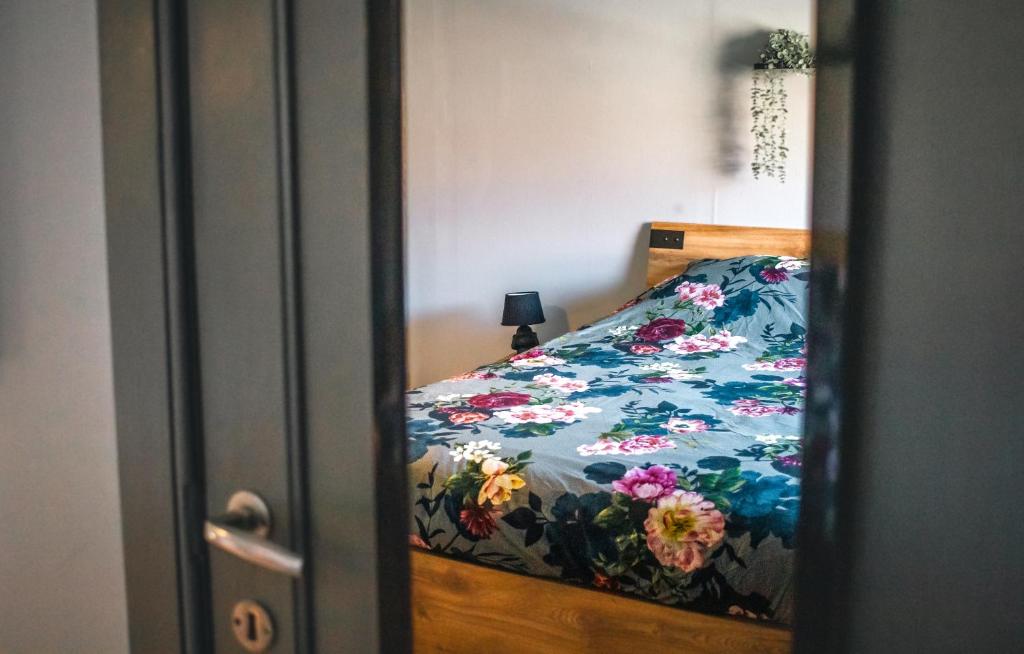 Postel nebo postele na pokoji v ubytování Le petit Broux