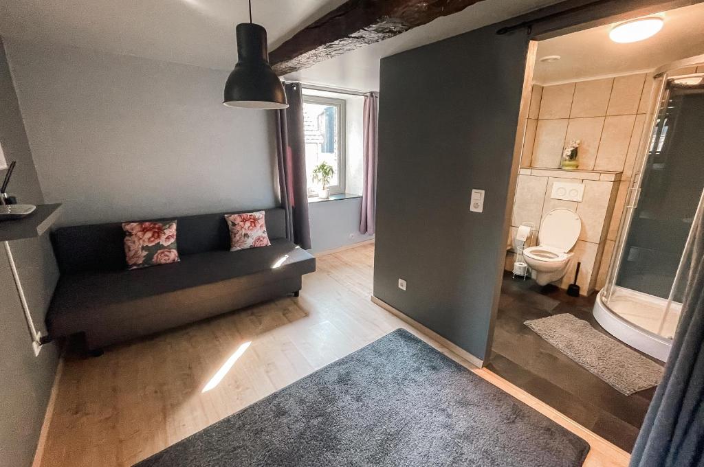 Postel nebo postele na pokoji v ubytování Le petit Broux