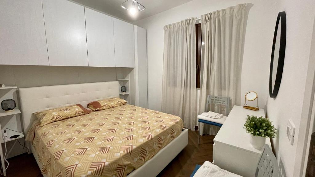 Postel nebo postele na pokoji v ubytování Baia Aurora