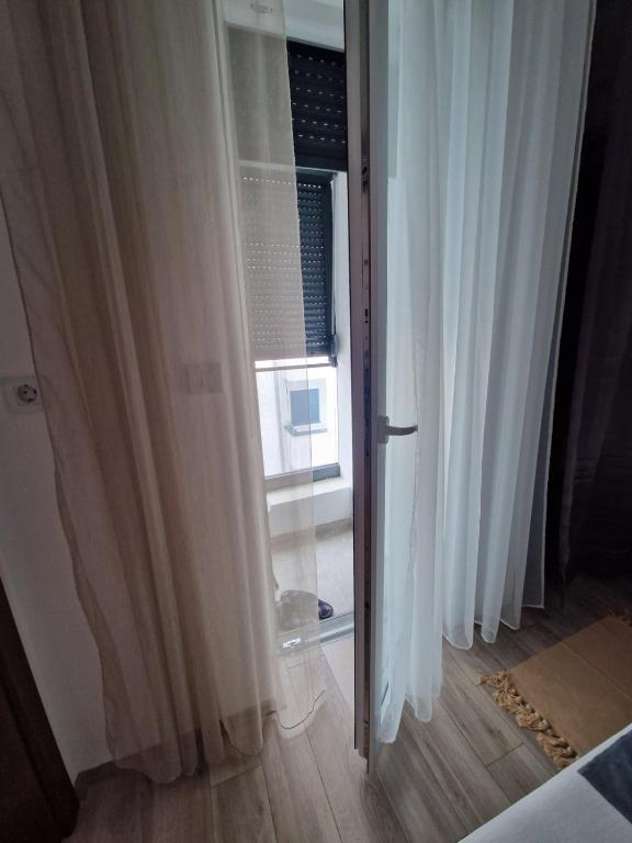 Krevet ili kreveti u jedinici u okviru objekta apartman TARA aqua park