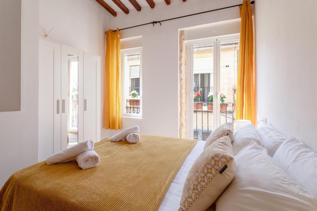 Postel nebo postele na pokoji v ubytování Bel appartement rustique au cœur d'Alicante
