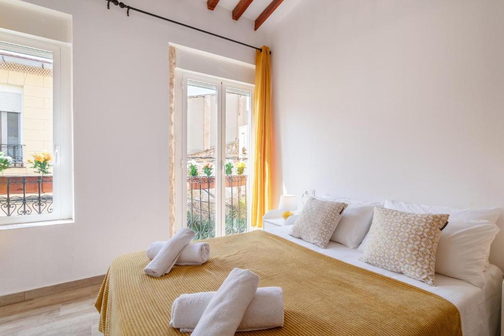 Postel nebo postele na pokoji v ubytování Bel appartement rustique au cœur d'Alicante