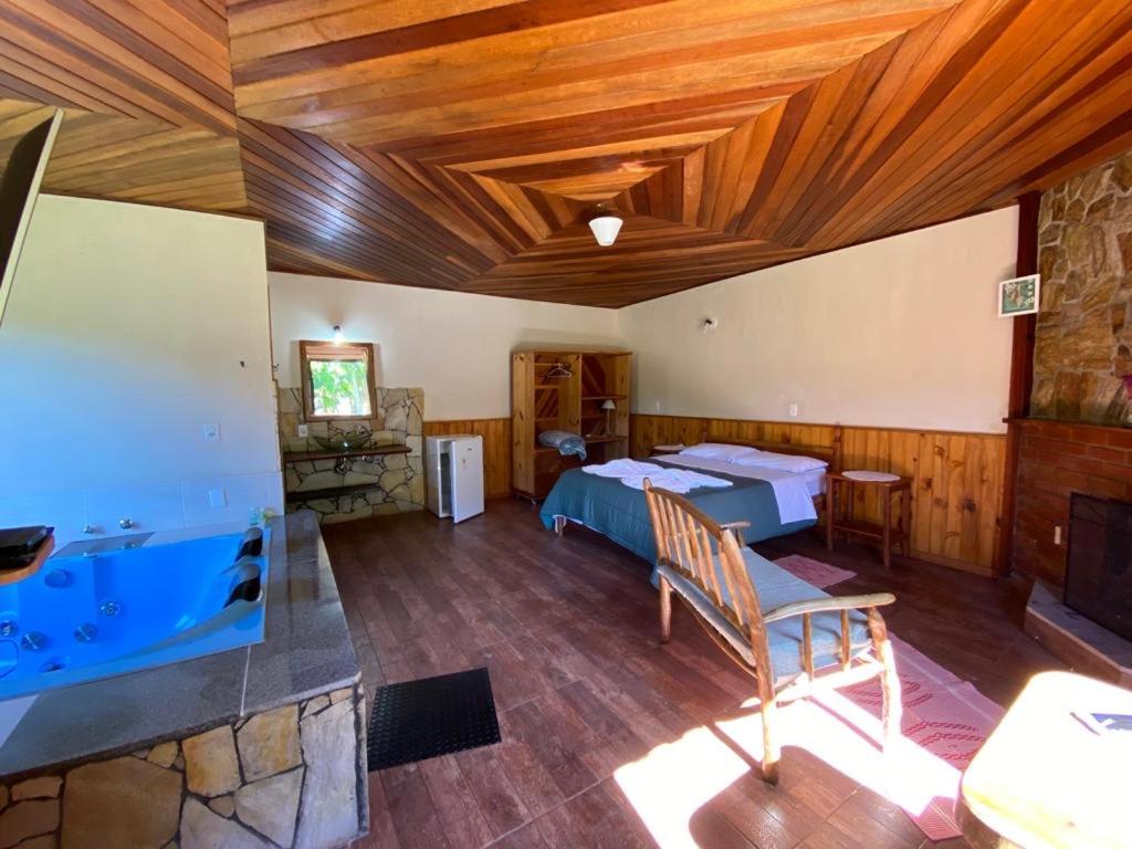 Postel nebo postele na pokoji v ubytování Pousada Algama