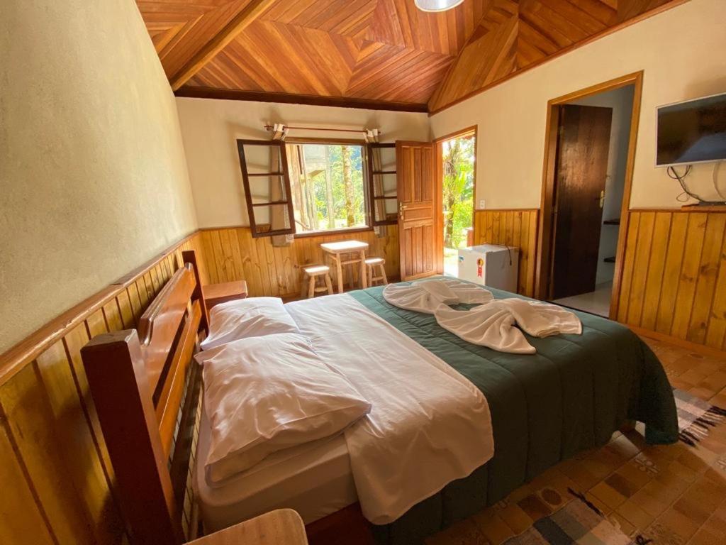 Postel nebo postele na pokoji v ubytování Pousada Algama