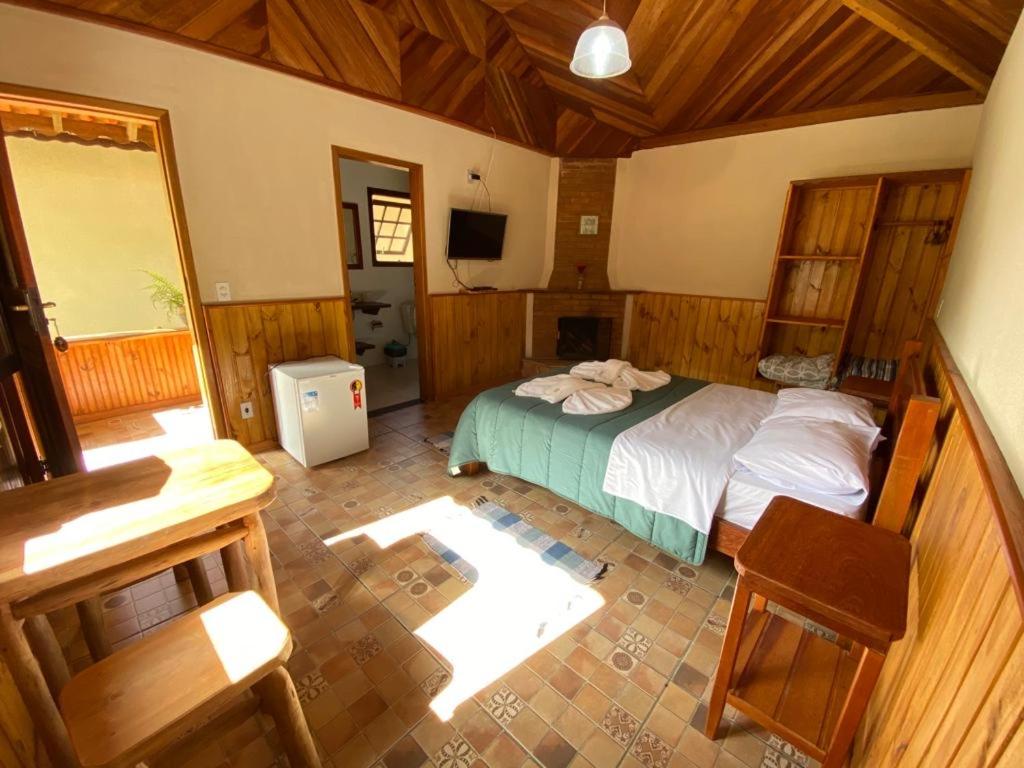 Postel nebo postele na pokoji v ubytování Pousada Algama