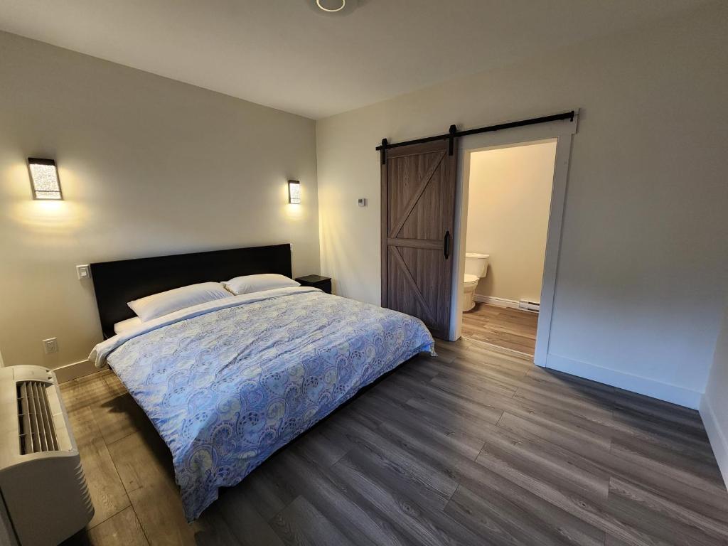 En eller flere senge i et værelse på City Centre Motel II