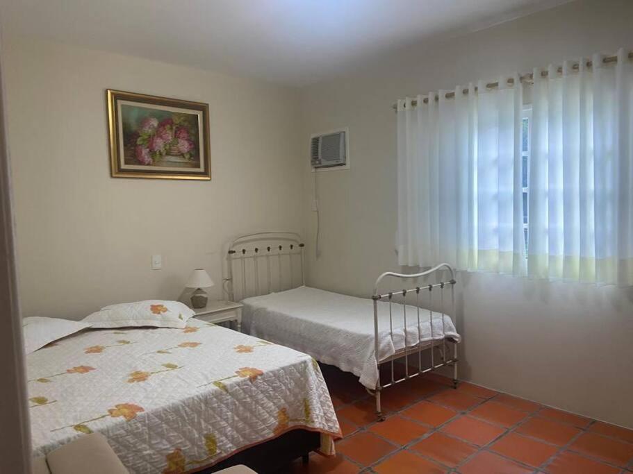 Katil atau katil-katil dalam bilik di Morada do Campo