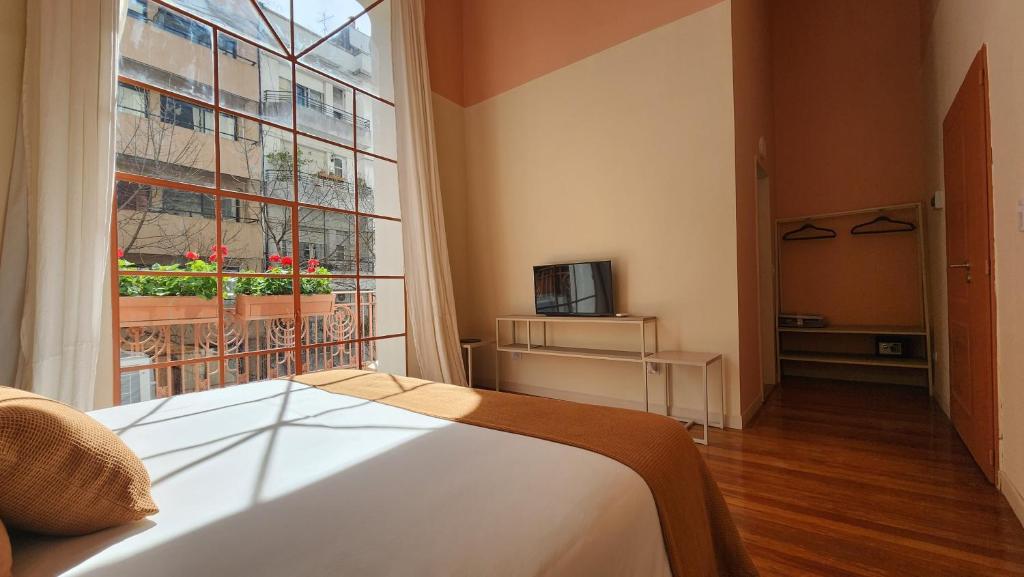 TV a/nebo společenská místnost v ubytování Casa Par Grand Suites