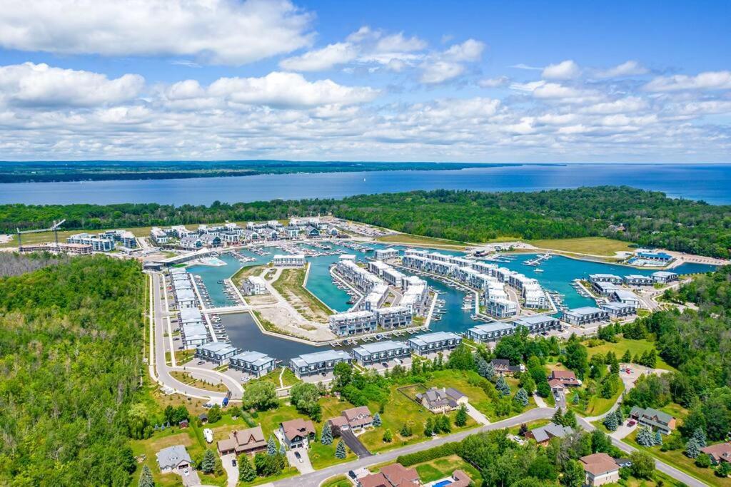 an aerial view of a marina with boats at Friday Harbour Resort Marina Cottage on Simcoe in Innisfil
