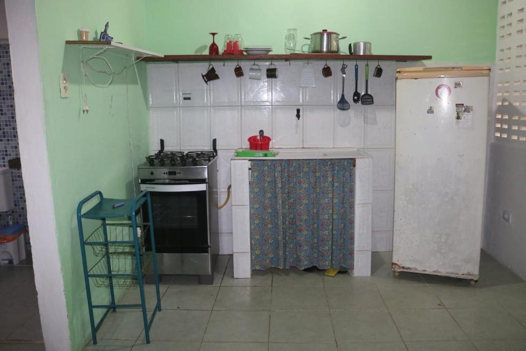 Kuchyň nebo kuchyňský kout v ubytování Casa de Temporada das Mangueiras